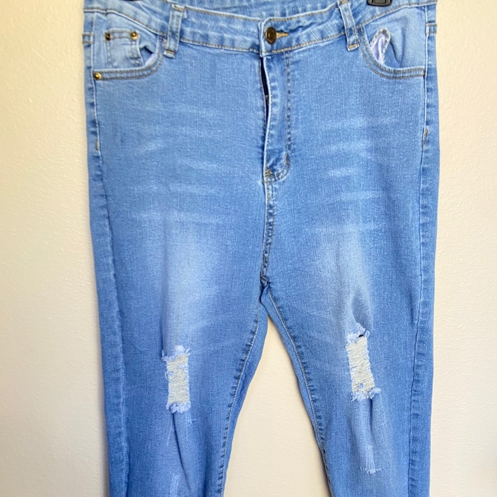 Distressed Thigh, Raw Hem, Light Blue Denim Jeans